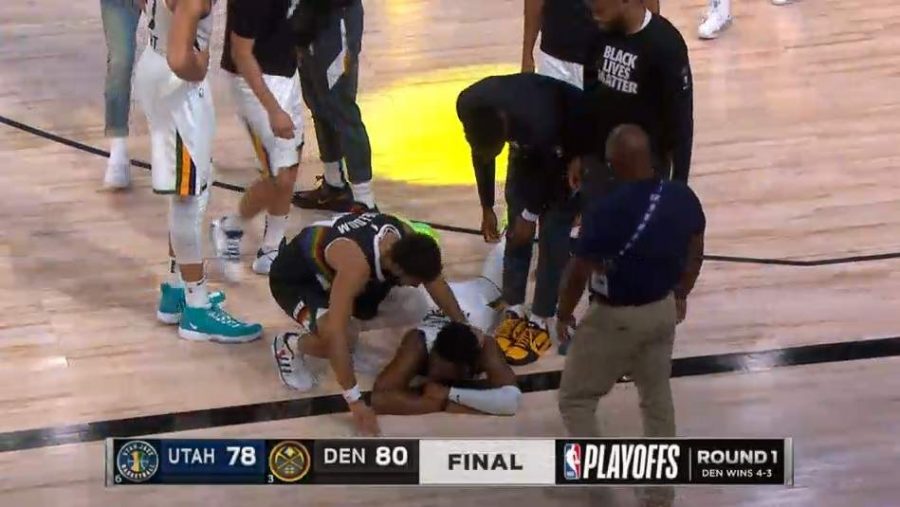 Utah Jazz Guard Donovan Mitchell, lays on the floor next to Denver Nuggets Guard Jamal Murray, after a heartbreaking defeat to the Denver Nuggets on Sep. 1 in the NBA “Bubble”.