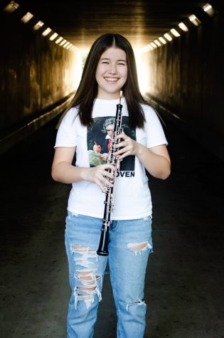 Noel Takaya and her main woodwind instrument, the oboe.