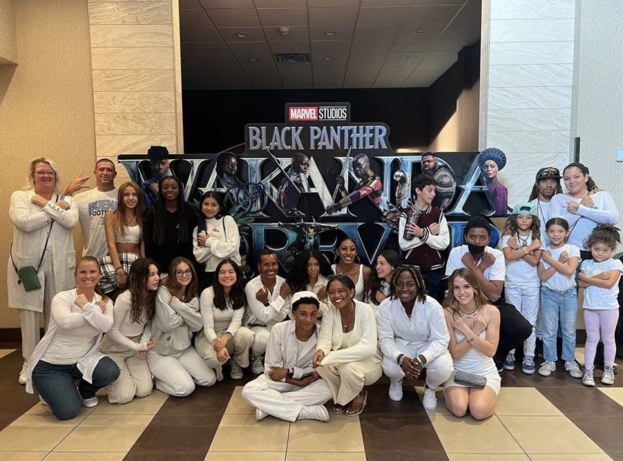 WAKANDA+FOREVER%21+The+Buena+community+gathers+together+for+the+private+showing+of+the+brand+new+Black+Panther+movie.+They+wore+white+in+commemeration+of+Chadwick+Bosemans+passing%2C+unlike+how+black+is+typically+worn+for+someones+death.+Were+all+celebrating+rather+than+mourning%2C+BSU+president+Shanice+Ware+said.
