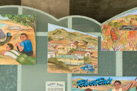 The image shows a mural, created in 2008, dedicated to the Tortilla Flats, a Hispanic community torn by the construction of the 101 freeway.