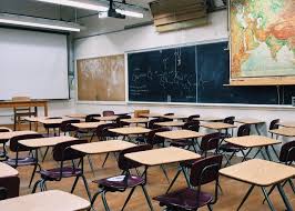 Empty classroom represents the students not being able to return to in-person learning.