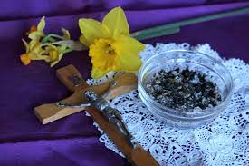 A common set up you might find in a Catholic Church on Ash Wednesday including the crucifix, and the ashes used in Ash Wednesday ceremony.