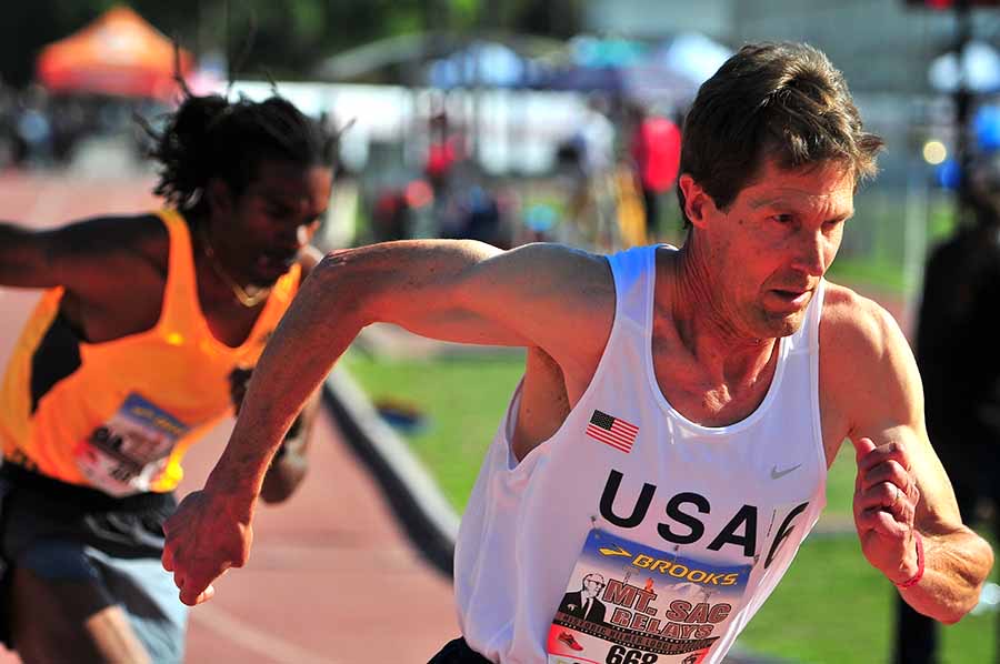 Ray Knerr launches himself into the 800 Mt. SAC relay, held in Hilmer Lodge Stadium where the worlds best athletes compete, as their slogan says.