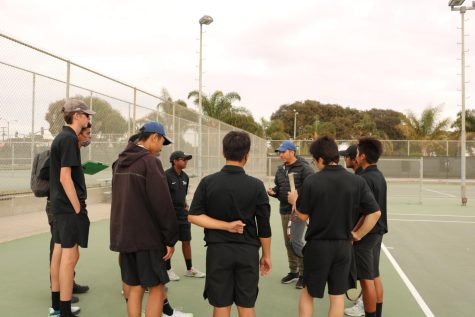 Boys tennis causing a racket for Buena