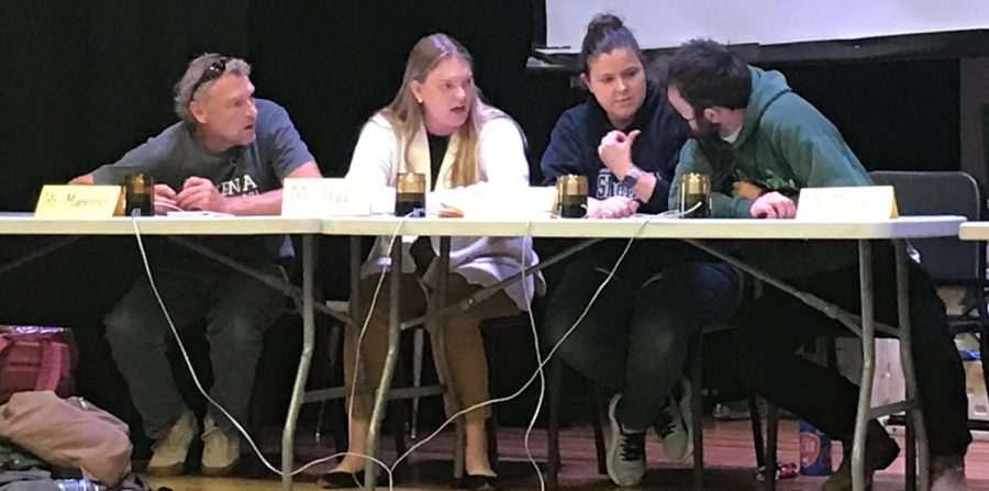 Left to right: Scott Mannine, Lauren Rad, Karin Childress, and Tylour Mullaney disscus the bonus question.