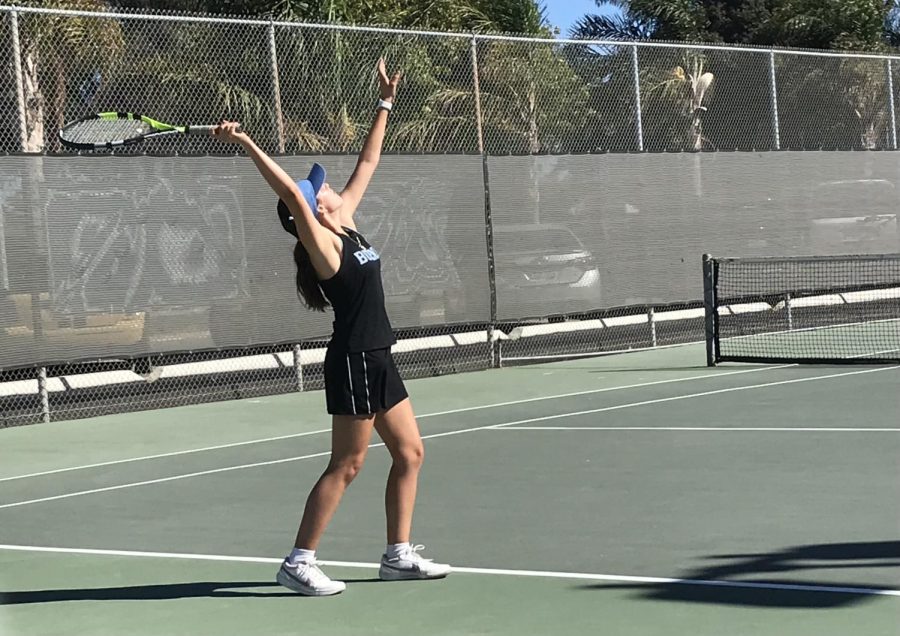 Wham! Junior Isabella Avila makes a direct serve to her opponent in red from the San Marcos team during her second match of the day, at Buenas home courts. 
