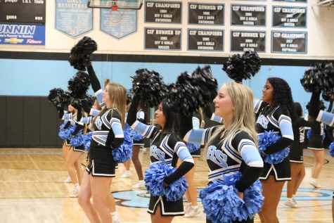 Buena varsity cheer hypes up the crowd during the rally.