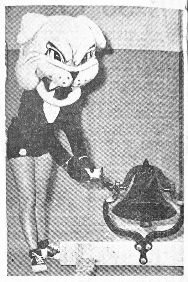 “VICTORY CLANG – Ringing Buena High School’s new victory bell is Spike, the Bulldog mascot, known as Jan McCormick.” The first Spike the Bulldog mascot head is featured here, which was used between 1962 and 1984. 