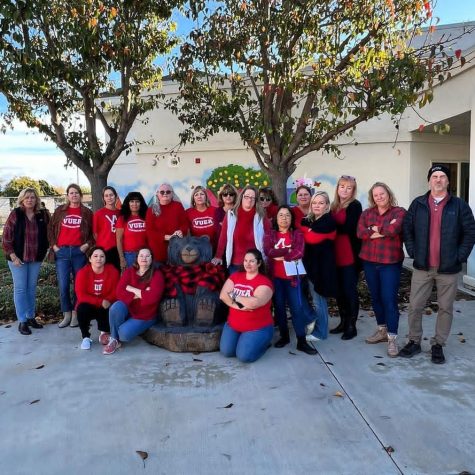 Educators wearing red for ed outside of Citrus Glen elementary, Dec. 5