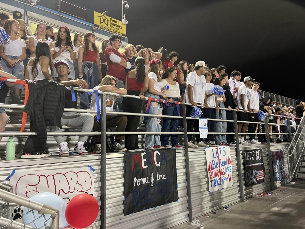 Buenas spirit section during the football game against Dos Pueblos High School had four rows of students, looking not particularly excited for the game.