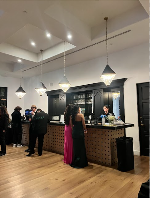 The remarkable bar was a big hit amongst students who needed a drink between dances, or a place to break away and socialize. Mocktails were served to create a sophisticated, mature feel to the dance. 