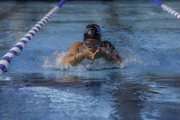 Isabella Prewitt moving quickly through the water in one of her senior year swim meets.