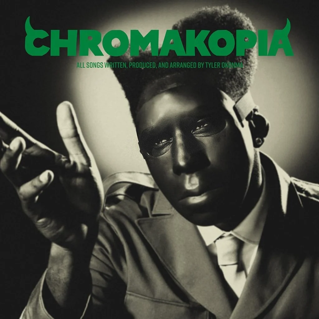 Tyler is shown in the album cover wearing his mask and new hairdo.