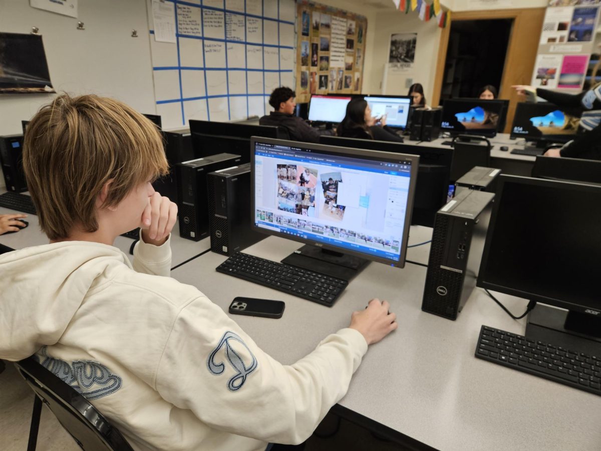 Yearbook student, Aidan Beaver,  editing photos that will be showcased in the 2025 yearbook.