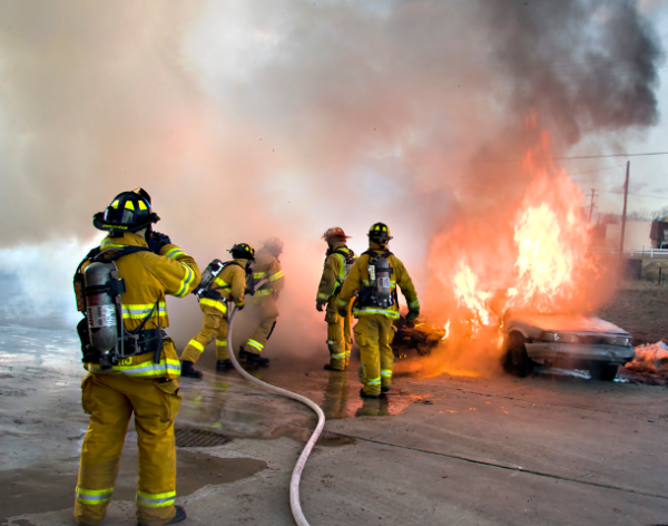 Firefighters in a head to head battle between them and the fast winds spreading the destructive flames. 