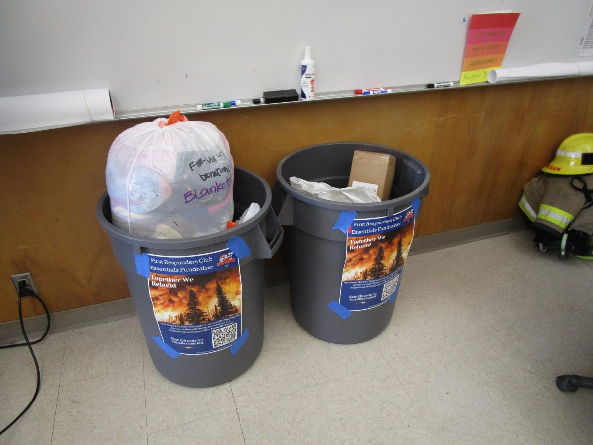 The two bins that the first responders club is using to collect donations sit proudly in room 101.