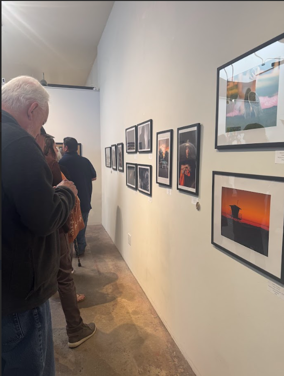 Ventura Public walks through the showcase, admiring the student's art, sculptures, and photography.