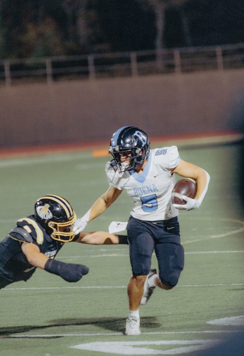 Senior running-back Jaxson Roberts pulls the helmet of a Ventura player, securing the first touchdown for the Bulldogs.