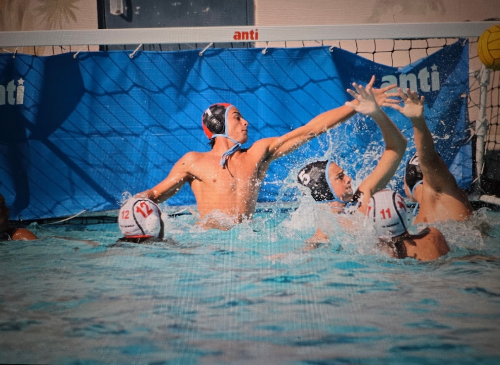 Goalie Mack Munger goes for the save as Oxnard make a shot attempt from the outside with no success.