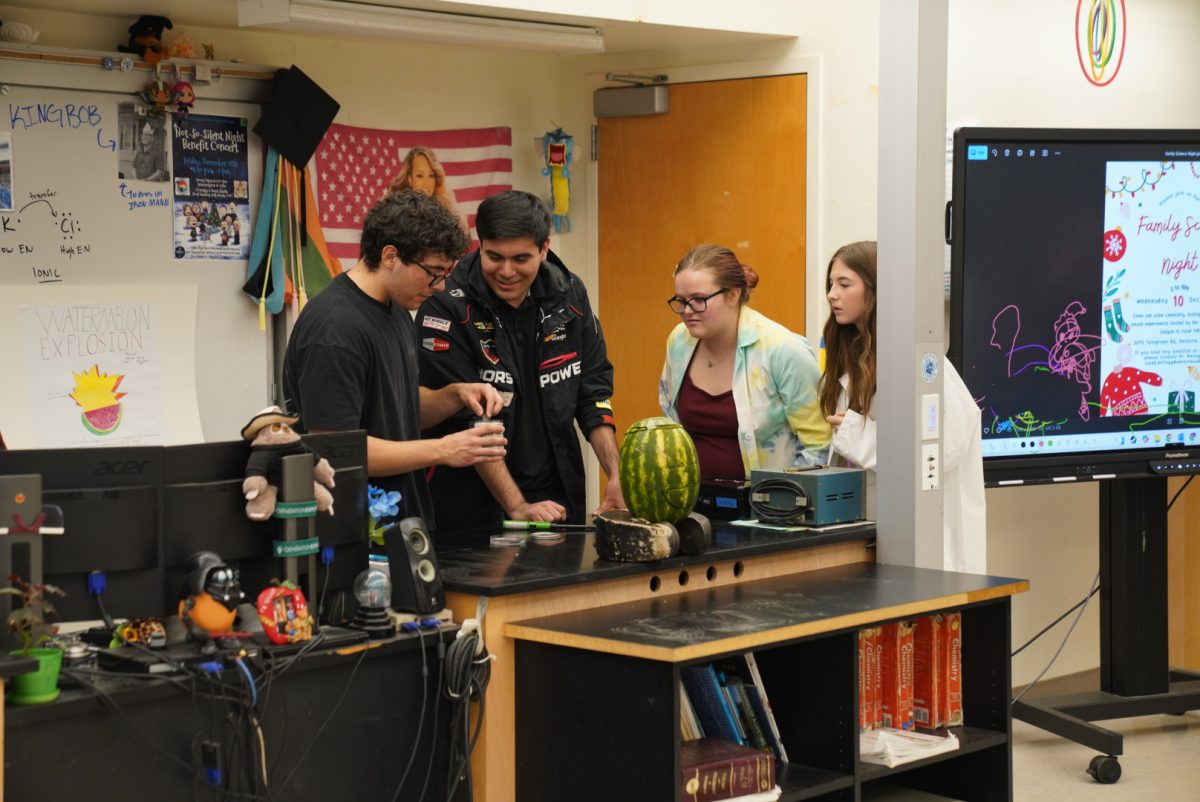 Students work on the exploding watermelon experiment, which was a highly anticipated one.