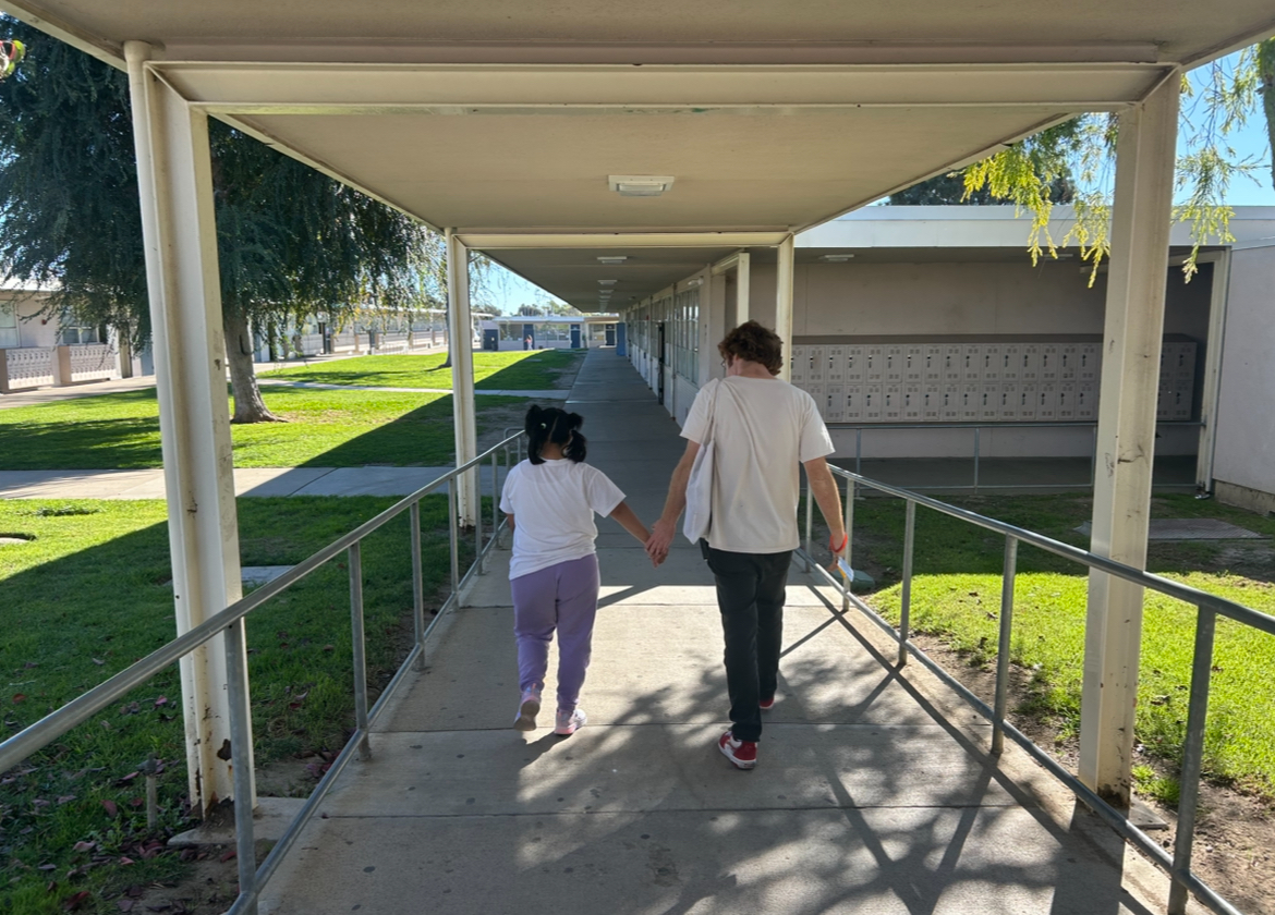Para Educator Max Breschard and his student Stephanie often take walks around the campus between work time. 