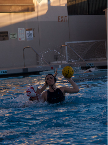 Freshman Kennedy Bouffard with the ball against opposing player. 