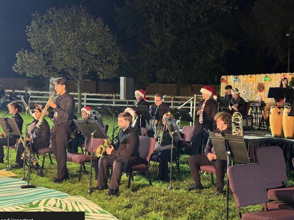 Senior Alejandro Portillo performs his bass saxophone solo in God Rest Ye Merry Gentlemen. 