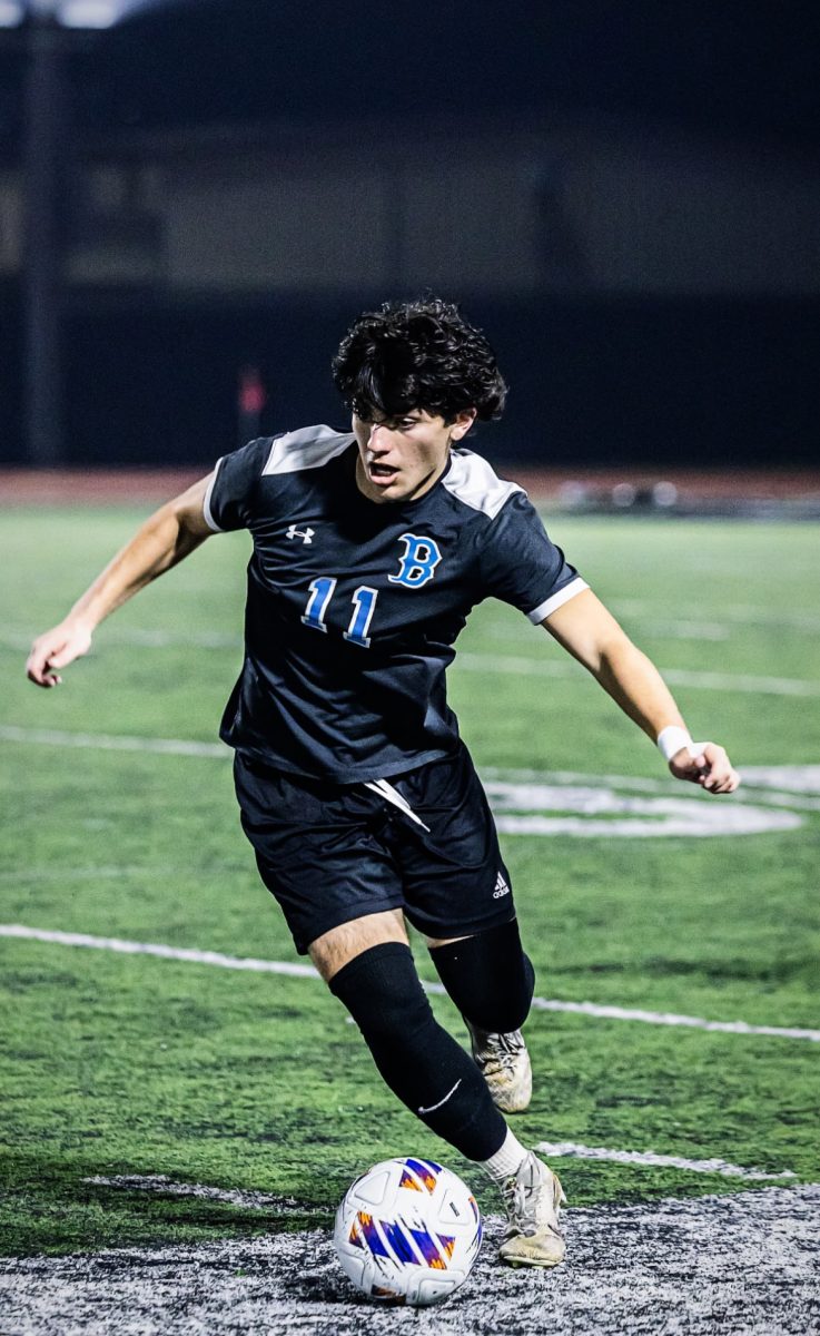 Senior Tyler Jaitt looks to pass the ball to a teammate. 