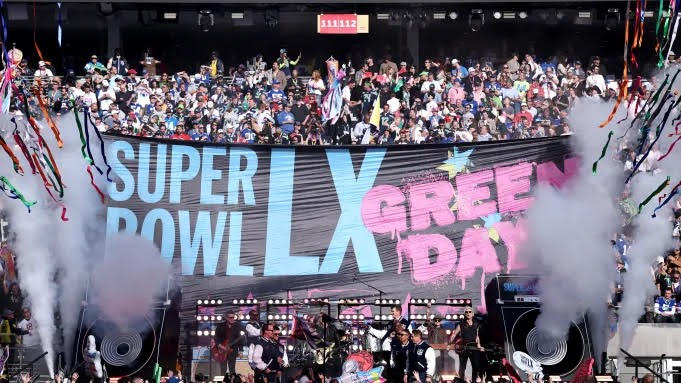 Green Day Superbowl LX banner, which went up during the performance.