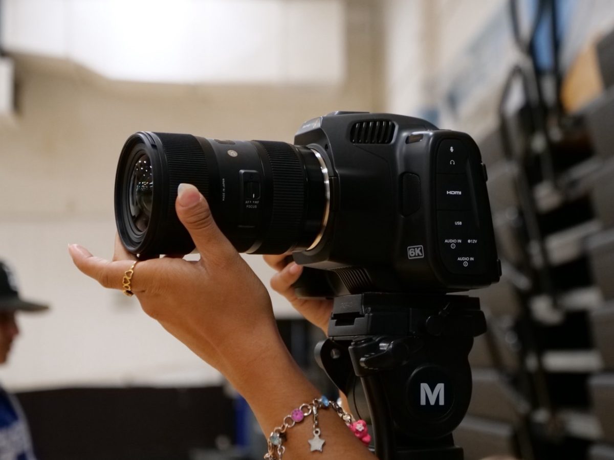 A camera is posed in position ready to film a scene.