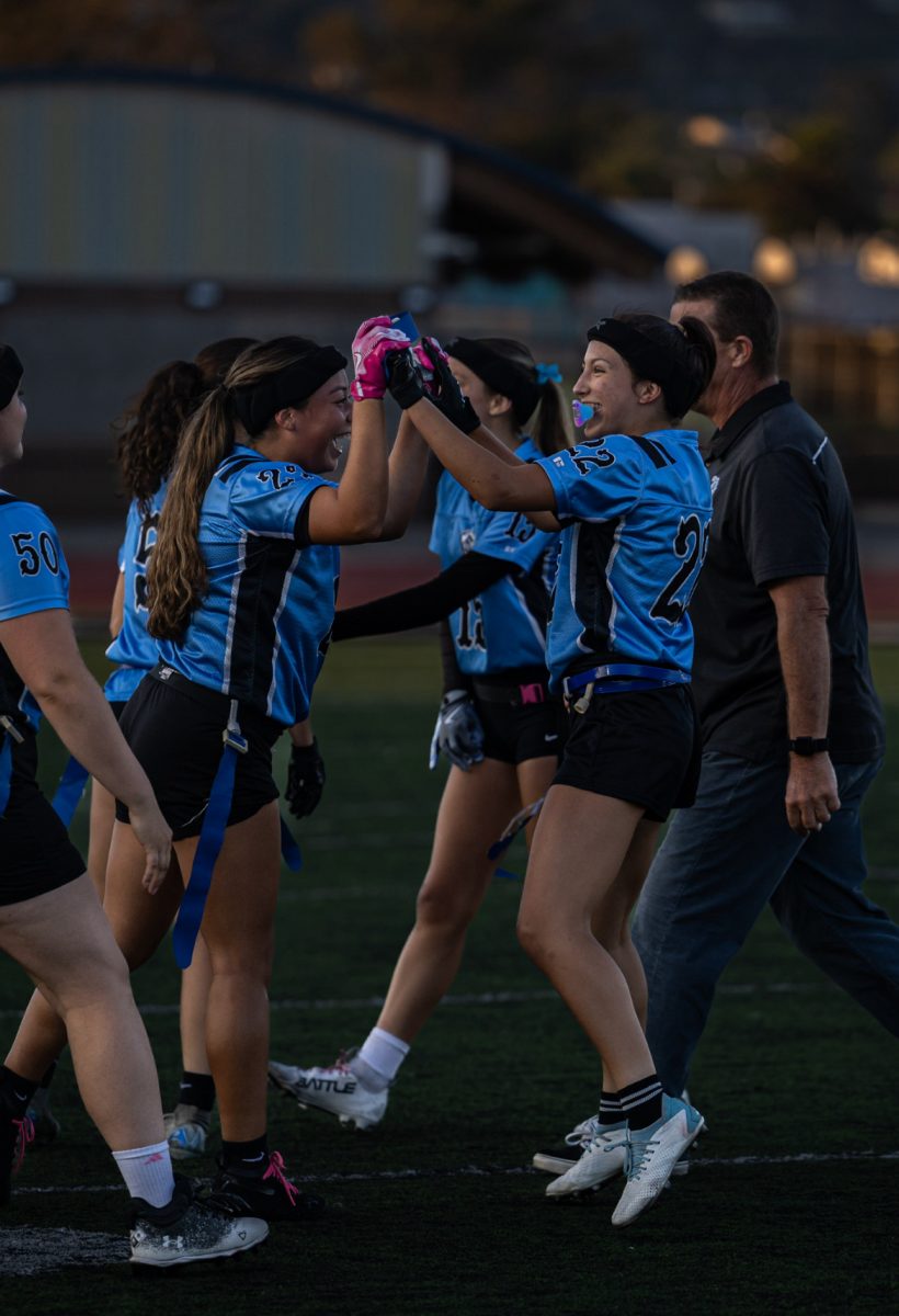 Aspen Taminich gets celebrated after securing the game with an interception in just the final seconds. 