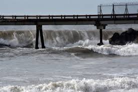 Rising swells from storms that can be destructive for coastal structures.