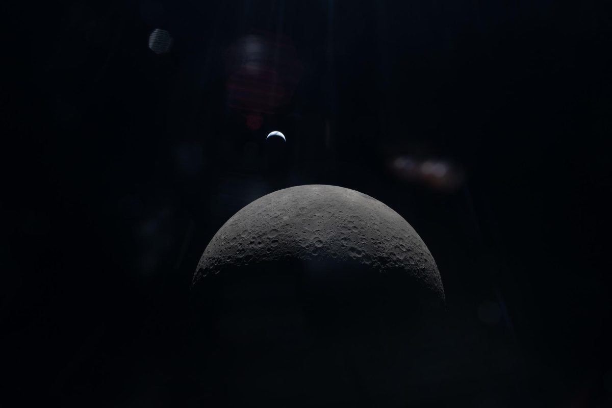 Picture of the moon in "Mare Orientale" with a crescent of Earth above.