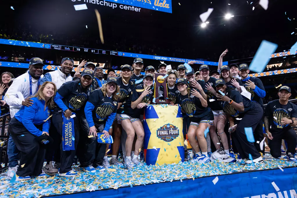 A photo of the Bruins celebrating the win.