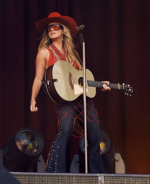 Lainey Wilson performing at the All-American Roadshow.
