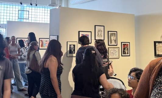The Vita Art Center was packed with student artists, caterers, family, friends and even customers ready to purchase some art.
